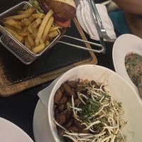 Burger and beef salad  at La Sala in Marbella