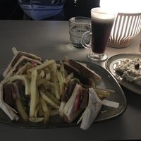 Vegan club sandwich and aubergine salad dish with almond milk Irish coffee  at Cafe12 in Crete