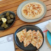 Stuffed vine leaves, pita, green pie with Cretan greens at Cafe12 in Crete