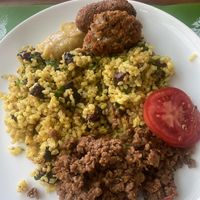 Rice with baked banana pieces, mashed banana and vegan protein minced meat at Bardana Cozinha Natural in Rio De Janeiro
