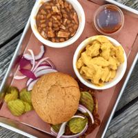 The chopped beef sandwich, Mac n cheese, and baked beans at PlowBQ - Food Truck in Austin