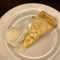 Vegan apple custard tart with vanilla ice cream at Pendle Witch in Lancaster