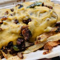 Cheesesteak fries- HUGE serving size at Angelhearts Donuts in Ithaca