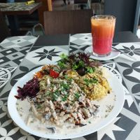 Stroganoff with seitan, rice, salad  and fresh juice at Vegan Story in Lisbon