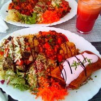 Beans chili, "folhado" pastry, vegan cheese over grilled veggies at Vegan Story in Lisbon