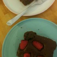 Vegan brownie with raspberries at Kawa in Poznan