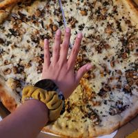 tried to use my hand for scale.... this is like an xxl pizza size lol at Pizza Flora in San Jose