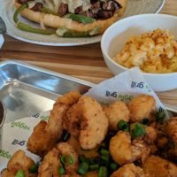 Beyond cheese steak, crispy cauliflower with orange sauce, and mac and cheese at Veggie Grill by Next Level in Cambridge