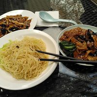 Noodles with spicy beancurd and mushrooms  at GōngDé Lín - Godly - Huanghe Rd in Shanghai
