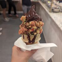 Vanilla and matcha swirl with chocolate hardshell and strawberry cheesecake crumbles at Big Softie in Atlanta