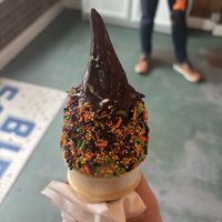 Vegan matcha soft serve with a chocolate hard shell and sprinkles    at Big Softie in Atlanta