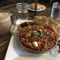 Pistachio latte, mememen, and spinach cheese borek in the back  at The Baklava Lady in English Town