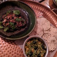 Chilli fried aubergine with sides  at Thali in Cape Town