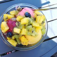 Mango, blackberry and strawberry ice cream with pineapple, blueberry & kiwi fruit as topping  at Eismanufaktur Soest in Soest
