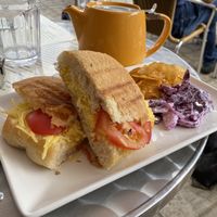 Vegan cheese and tomato panini with vegan slaw and crisps at Barkers Cafe Bar in Helmsley