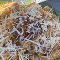 Creamy tomato pasta with vegan Parmesan  at Greens & Co in Galway