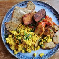 Tofu scramble with tempeh bacon and GF bread at Greens & Co in Galway