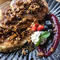 Pancakes with caramelised almonds, cream and berries at Greens & Co in Galway