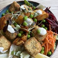 Vish and Smashed Potato Caesar Salad Bowl  at Greens & Co in Galway