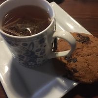 Yummy dark chocolate chip cookie with berry tea! 🍪 ☺️ at Greens & Co in Galway
