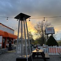 Outdoor seating near sunset   at IPho in New Paltz