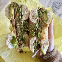 Vegan bagel sandwich with regular tomatoes instead of sundried   at Bagel Kitchen in Pacific Grove