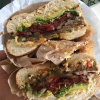 Vegan lover on an Everything bagel with added hummus at Bagel Kitchen in Pacific Grove