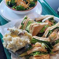 Famous turkey club with a side of smashed potatoes and a potato broccoli cheese bowl. at eden in Wilkes-barre
