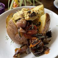 jacket potatoe with roasted vegetables and vegan cheese  at The Cracked Teapot in New Ross