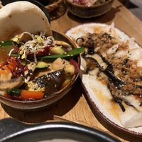 Burger and veggies in steamed bun + rice cakes  at Vegan House - Alaunstraße in Dresden