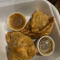 An order of vege samosas comes with 2. Crispy outside with veges and potatoes inside. Slight mild spice   at Himalayan Kitchen in Kailua