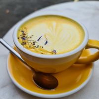 Turmeric latte with oat milk at Sunny Side Up - Westend in Frankfurt