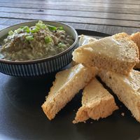 Mungbean stew with homemade vegan bread and nut spread at Noina's Mystic Mountain Restaurant & Bungalows in Koh Samet