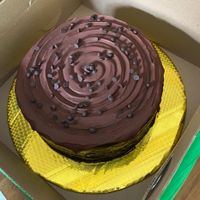 Great moist cake with tasty frosting and a nice firm chocolate shell at Yvitta in Merida