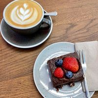 Oat Cappuccino and vegan cheese cake. at Rebelbean Vlněna in Brno