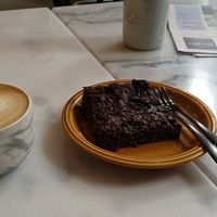 Cappuccino with oath milk and vegan brownie at Mica Coffeebar in Haarlem