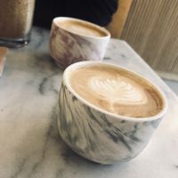 Liquid heaven, also known as coffee. (2 x oat milk cappuccino)   at Mica Coffeebar in Haarlem