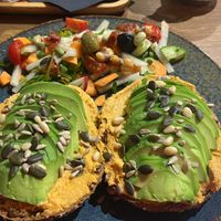 Heerlijk bruin broodje, harissa hummus…vegan.  at Smaeck in Weert