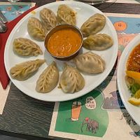 Nepalese dumplings, mixed vegetables in tomato curry  at Mero Buddha Nepali Kitchen in Muenster