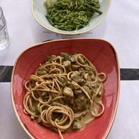 Trofie with vegan pesto, potatoes and green beans above, whole grain spaghetti with sautéed zucchini and almonds cream below 🤤  at Lo Spuntino in Camogli