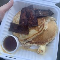 Breakfast pancakes with tofu bacon  at Flux in Brighton