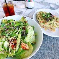 Green goddess salad, cold brew, and avocado toast at Cafe Roze in Nashville