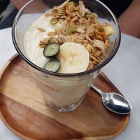Coconut yoghurt with banana and granola at HART in Antwerpen