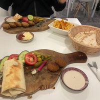Our entire order. Sesame falafel which comes with naan, special sandwich and chips  at Falafel en Hummus in The Hague