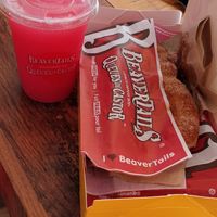 Strawberry lemonade slushie, classic and apple pie beavertails at Beaver Tails in Montreal