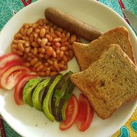 Vegan breakfast with vegan sausage at Pakachere in Zomba