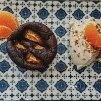 Tangerine 🍊 cupcake with coconut cream!   at Le Chat Chapeaute in Foix