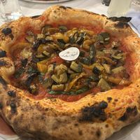 Vegan pizza with vegetables  at Bella Napoli in Bergamo