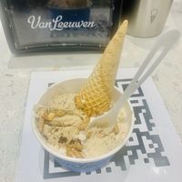 Vegan oatmilk brown sugar hunk & PB brownie honeycomb with crunchy sugar cone  at Van Leeuwen Ice Cream - Rock Center in New York City