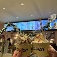Left: banana bread with walnut and chocolate churro (two scoops, one of each). Right: hot fudge sundae with whipped cream, hot fudge, and rainbow sprinkles     at Van Leeuwen Ice Cream - Rock Center in New York City